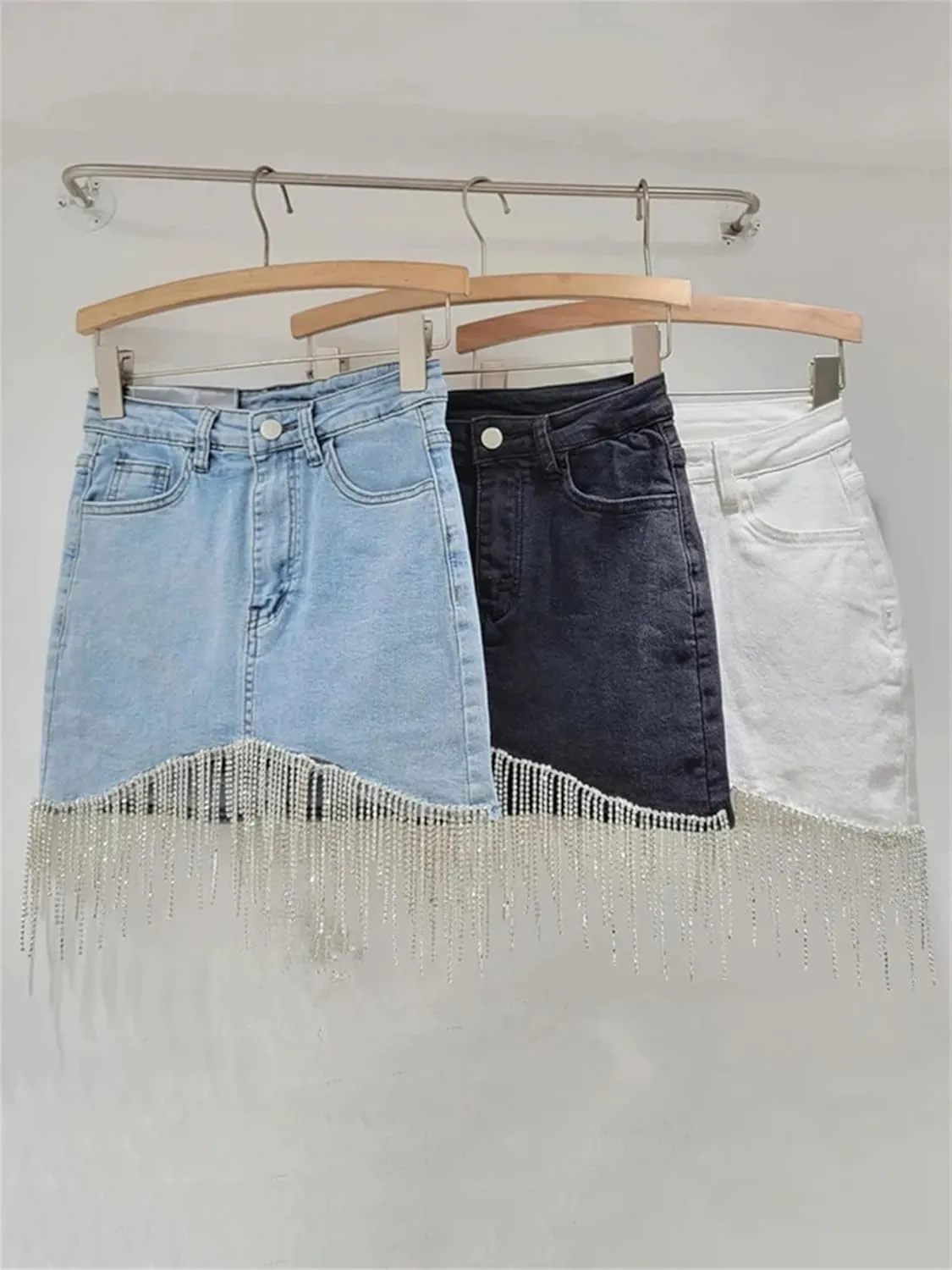 UIOKLMJH High Waisted Denim Skirt for Women Spring Busienss Office Irregular Tassel Wrap Hip Mini Skirt