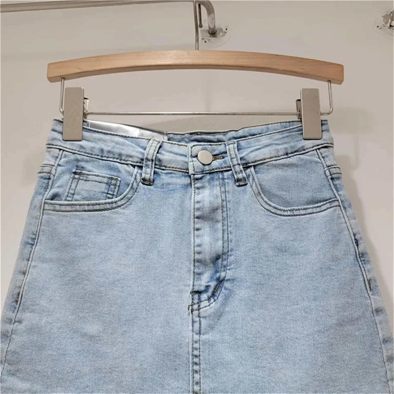 UIOKLMJH High Waisted Denim Skirt for Women Spring Busienss Office Irregular Tassel Wrap Hip Mini Skirt
